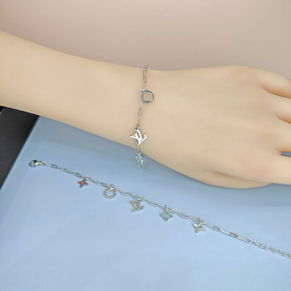 Stainless Steel Bracelets Bangles with Multi Pandants Four-Leaf Clover Cross Good Quality No Change Color For Women Girls  ES250108118