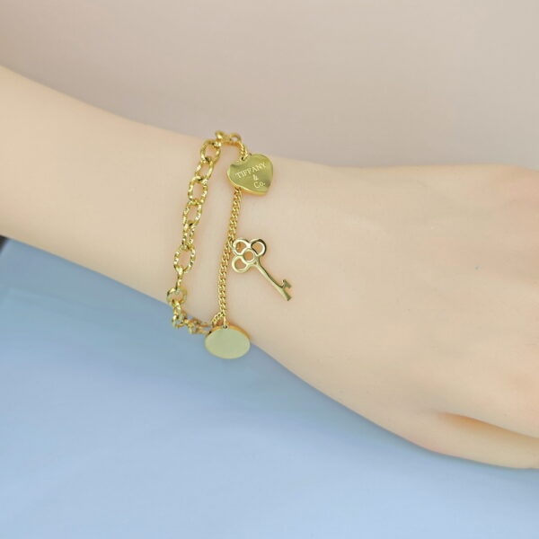 Stainless Steel Bracelets Bangles with Multi Pandants Key Love Hearts Good Quality No Change Color For Women Girls  ES250108149